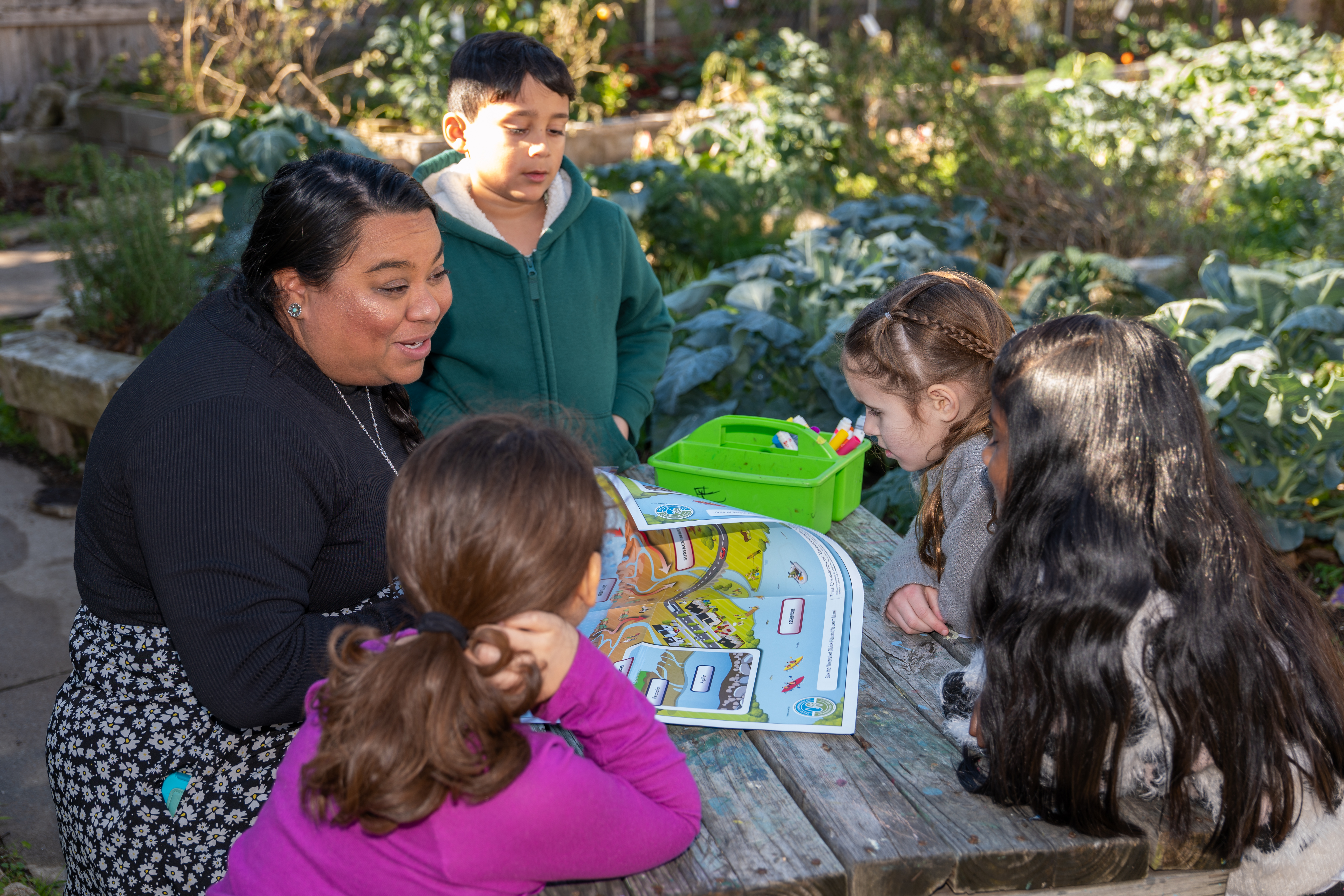 woman talking to kids