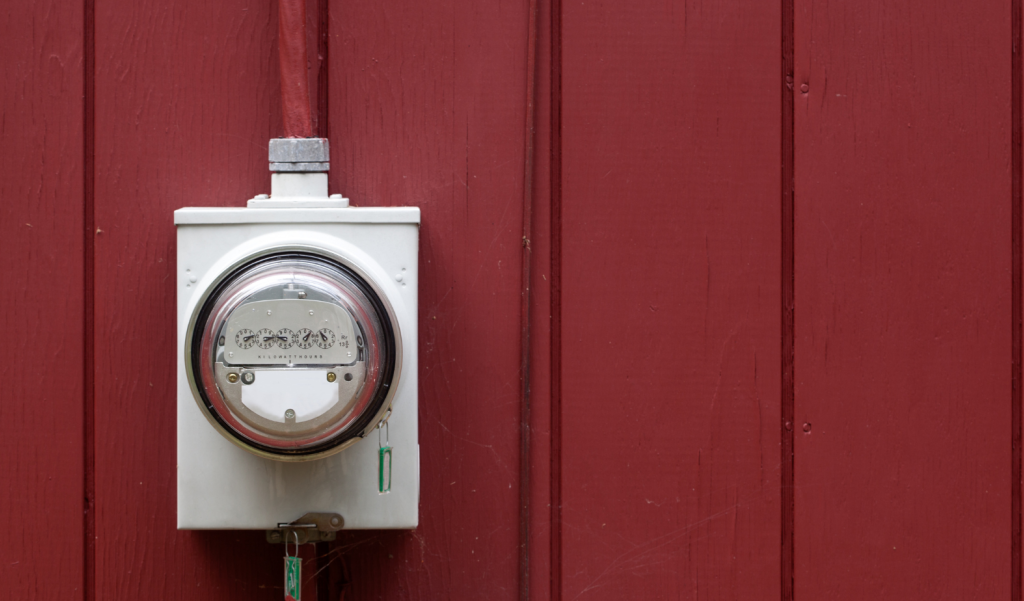 Electric Meter on a red wall