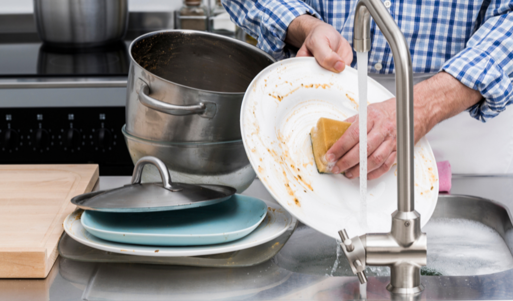 Washing dishes in the sink