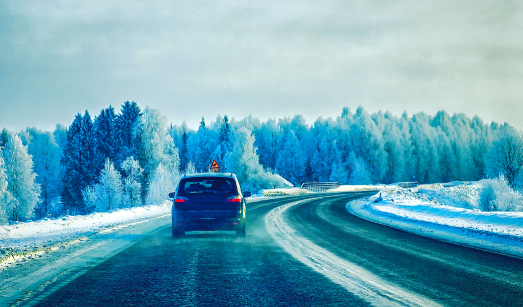 A car driving in a winterize road