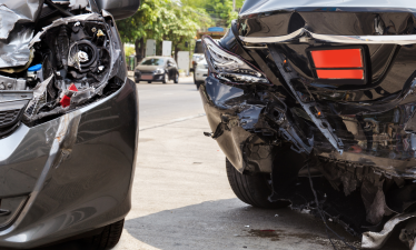 two cars in the aftermath of a wreck