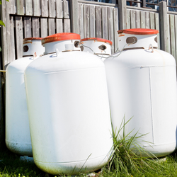 Is it dangerous to use an old or damaged propane gas tank to fuel