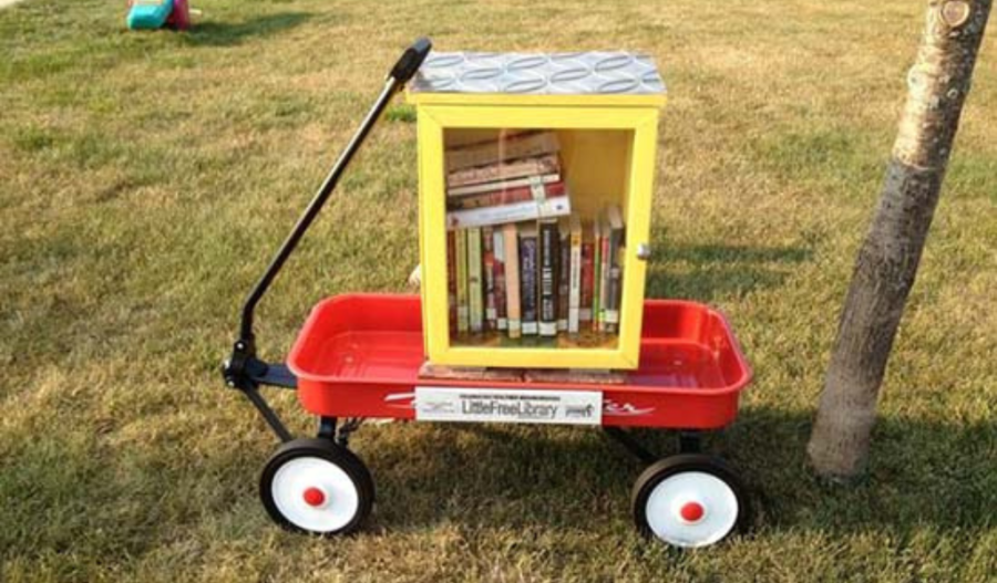 Red wagon as a mobile Little Library