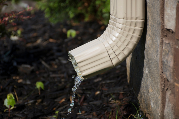 downspout draining rain