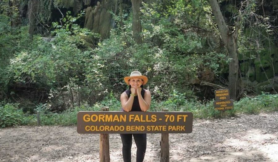 Josie Gutierrez standing at the entrance of Gorman Falls