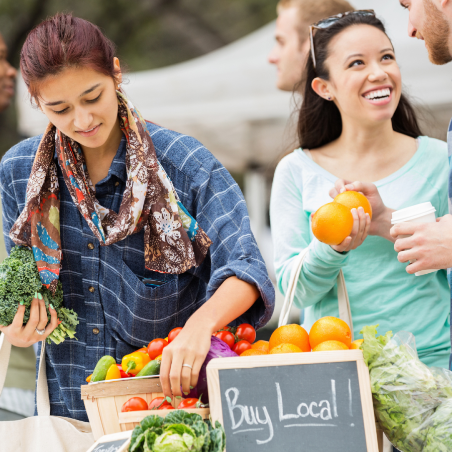 ladies shopping at a local farmers market 