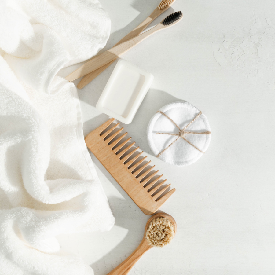 Bamboo comb, toothbrush, and reusable cotton rounds.