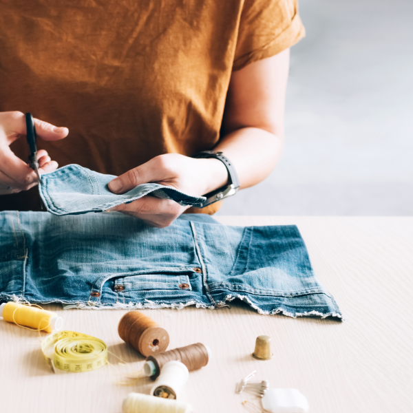 Denim being cut and sewn