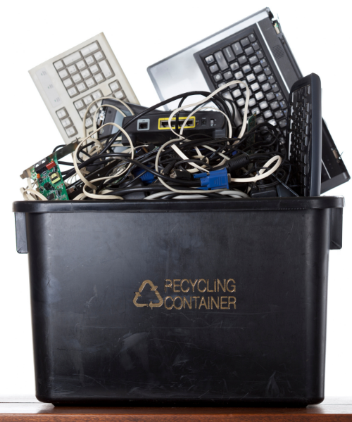 Electronics in a recycling container.