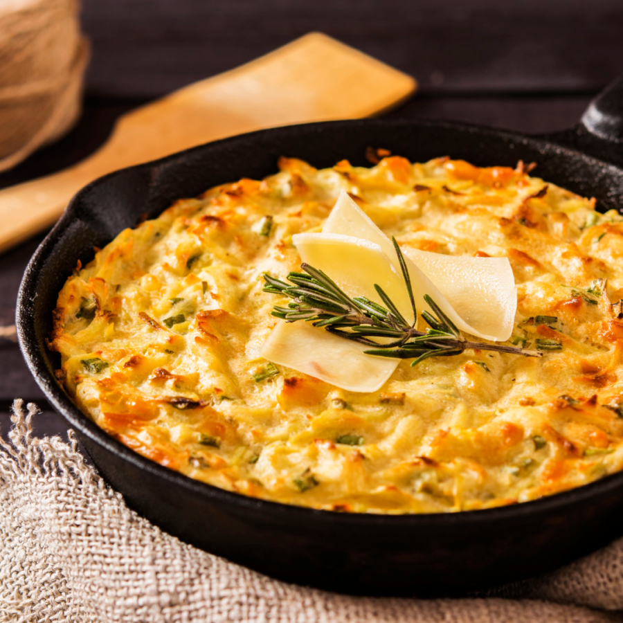 A bubbly casserole rest on the table. 